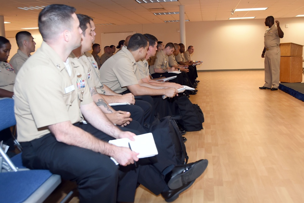 Commander, Naval Service Training Command visits with TSC chief selects