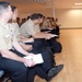 Commander, Naval Service Training Command visits with TSC chief selects