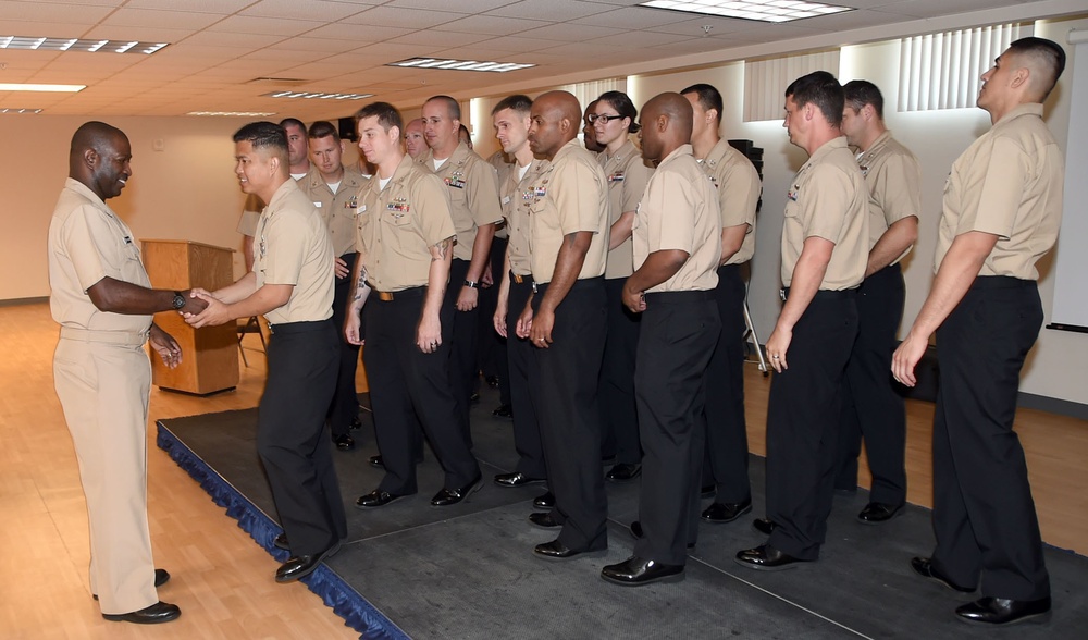 Commander, Naval Service Training Command visits with TSC chief selects