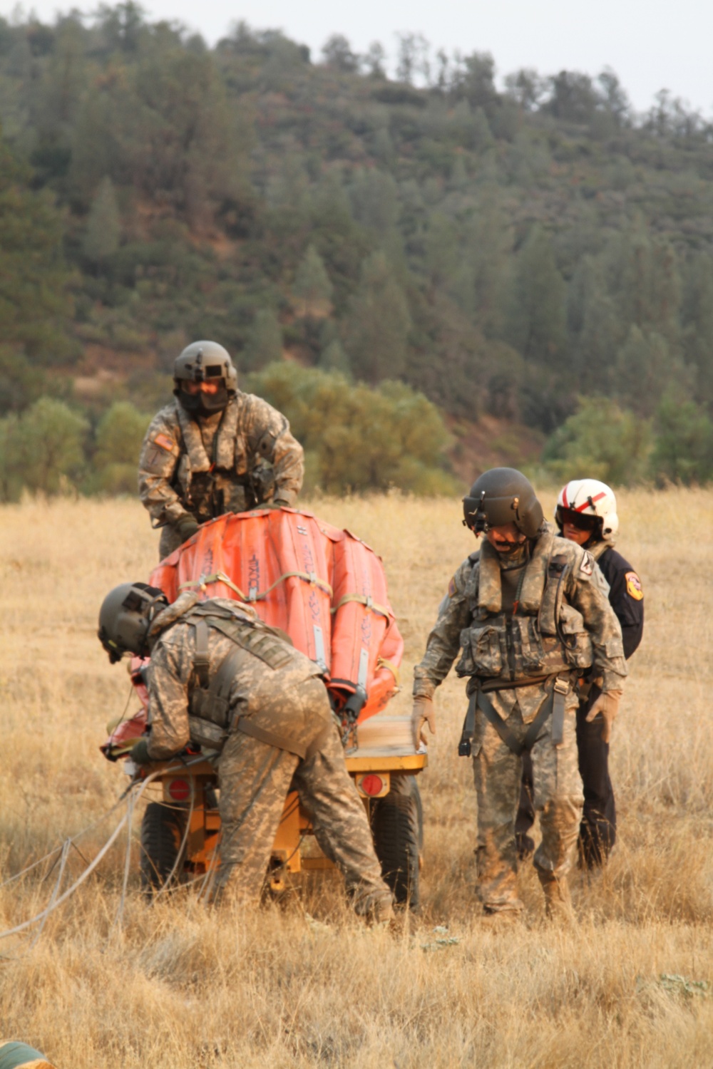 California Guard Chinooks drop water on Northern California wildfires