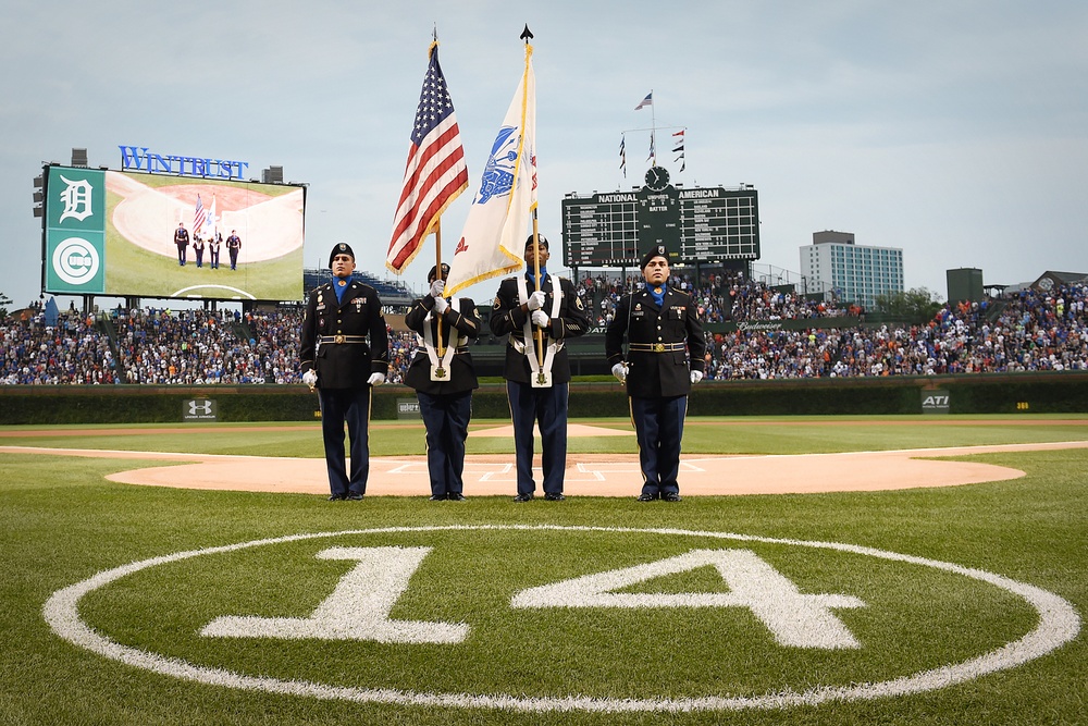 Army Reserve soldiers present the colors during Cubs home game