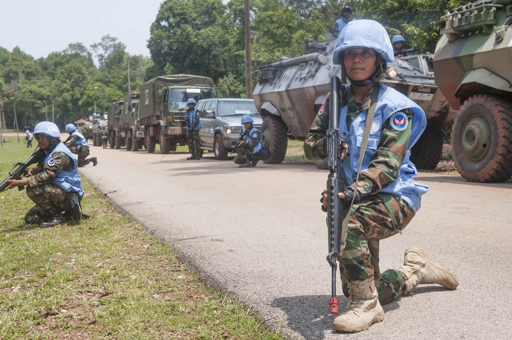 Cambodia army soldiers escort convoy during Keris Aman 2015