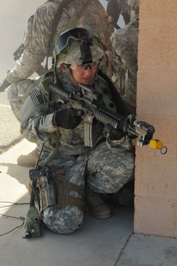 National Guard Military Police move, clear, secure during training