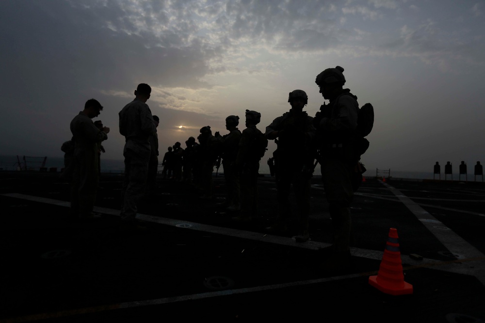 U.S. Marines sharpen marksmanship skills aboard the USS Anchorage