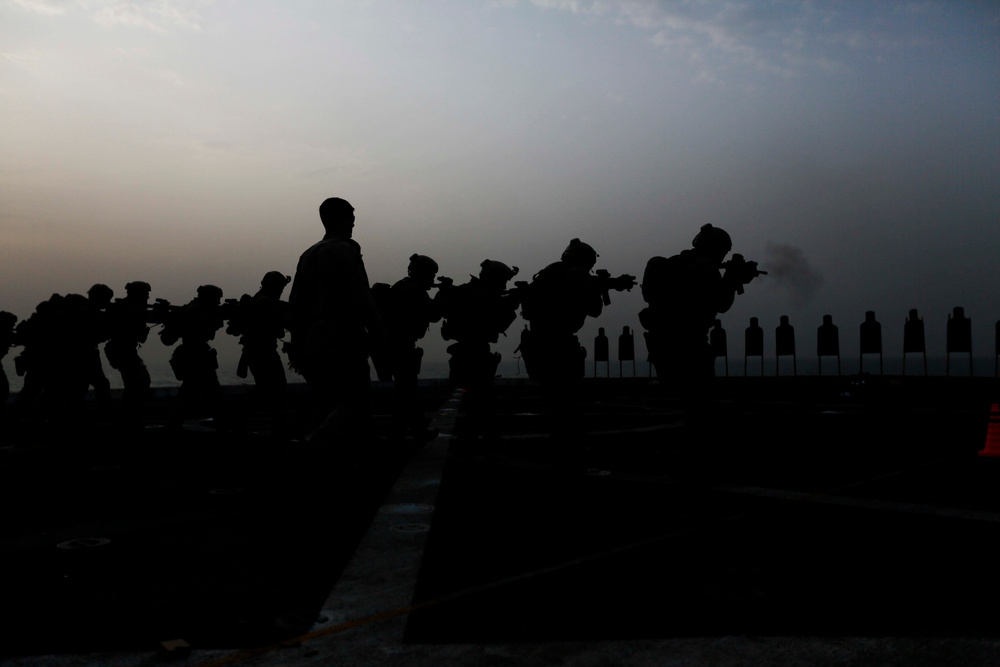 U.S. Marines sharpen marksmanship skills aboard the USS Anchorage