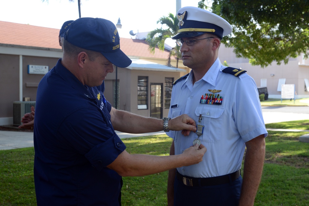 Coast Guard presents Silver Life Saving Medal to Coast Guardsman for saving a man from drowning