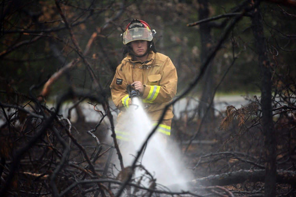 106th Rescue Wing firefighters check for hot spots