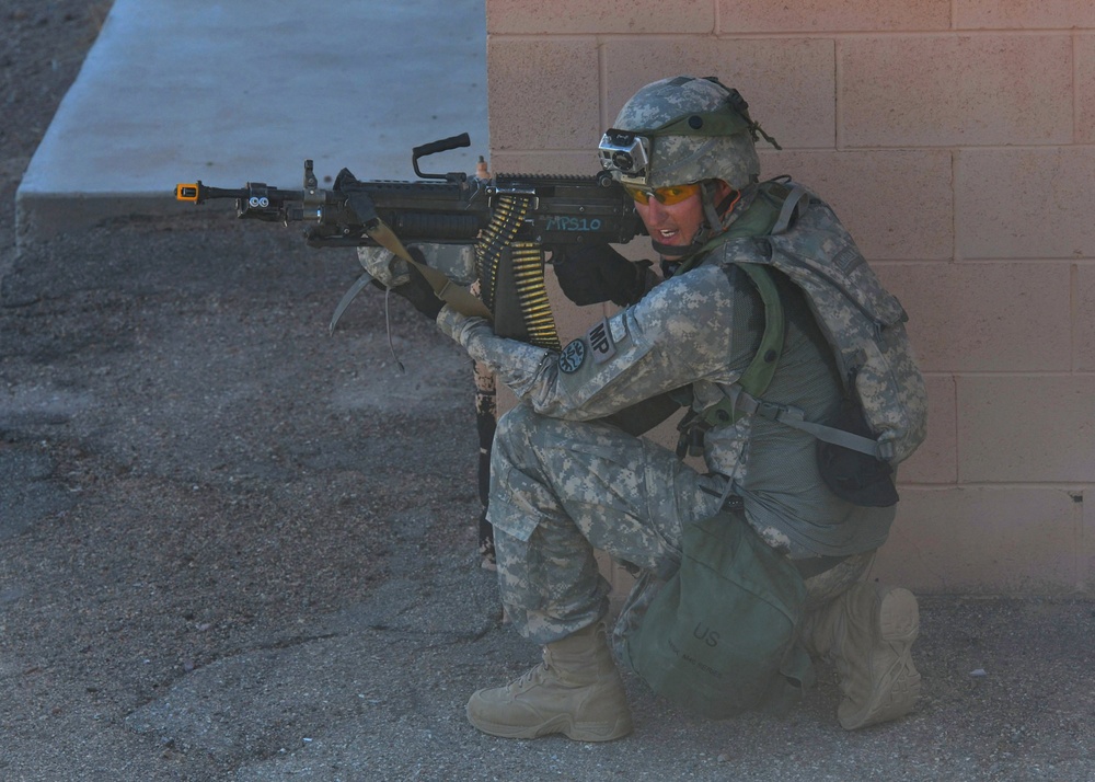 National Guard Military Police move, clear, secure during training