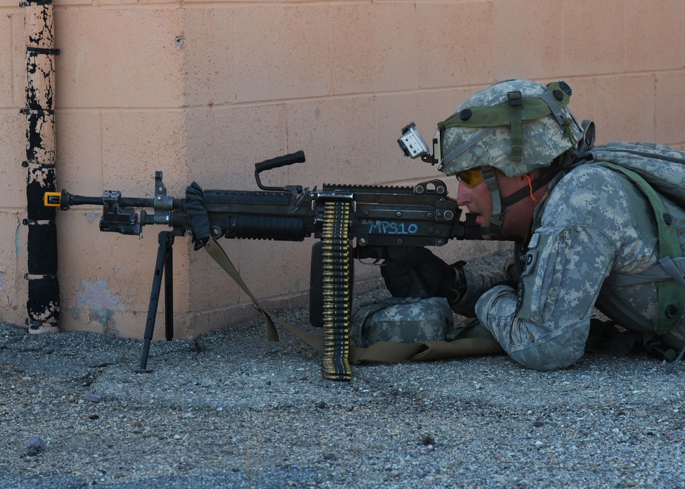 National Guard Military Police move, clear, secure during training