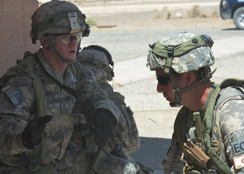 National Guard Military Police move, clear, secure during training