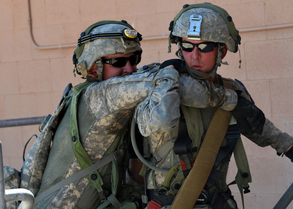 National Guard Military Police move, clear, secure during training
