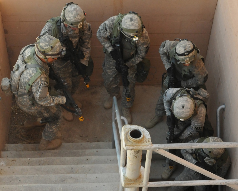 National Guard Military Police move, clear, secure during training