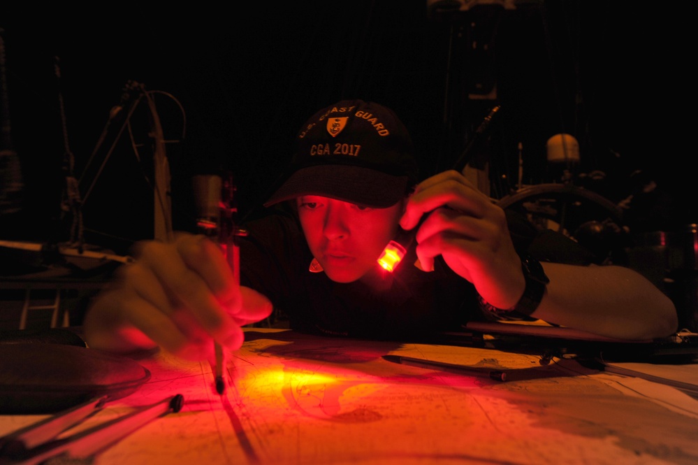 Coast Guard Academy cadets plot the Eagle's course