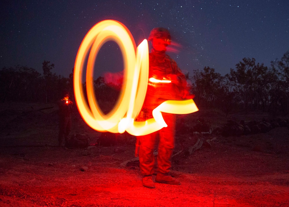 U.S. Marines and Australian soldiers conduct night helicopter training