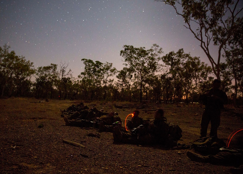 U.S. Marines and Australian soldiers conduct night helicopter training