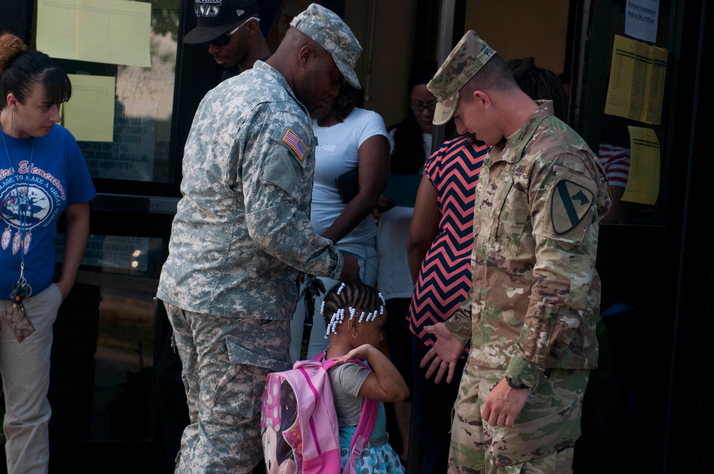 Fort Hood Soldiers help students on first day of school