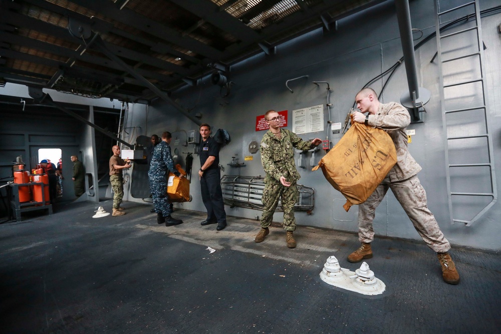 U.S. Marines replenish at sea