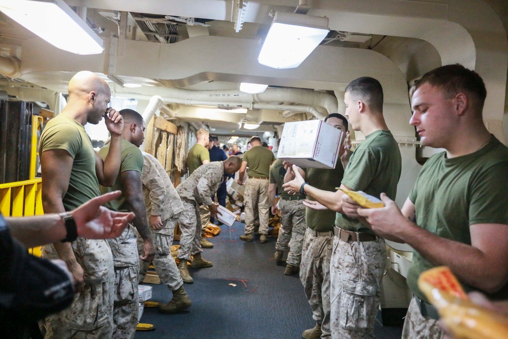 U.S. Marines replenish at sea