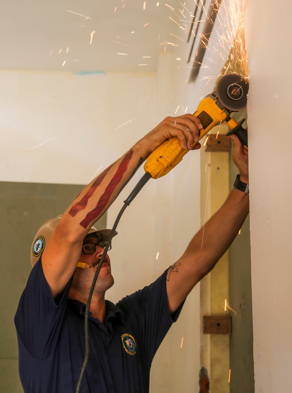 Navy Seabees and Air Force engineers renovate children's center during Pacific Partnership 2015