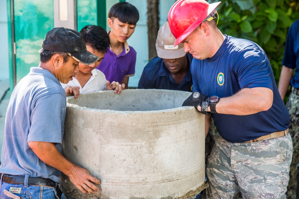 Navy Seabees and Air Force engineers renovate children's center during Pacific Partnership 2015