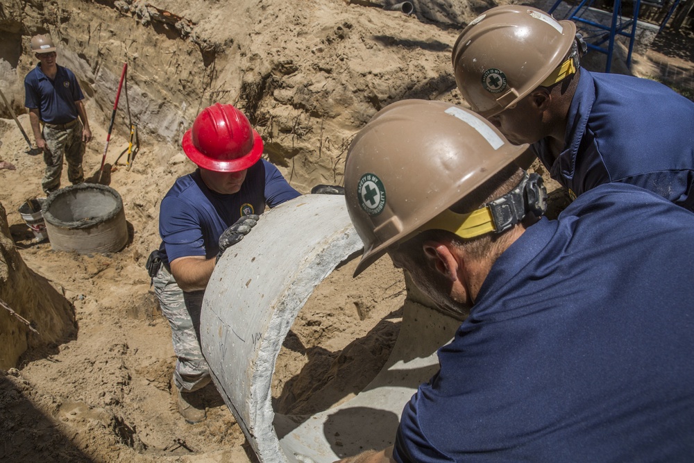 Navy Seabees and Air Force engineers renovate children's center during Pacific Partnership 2015