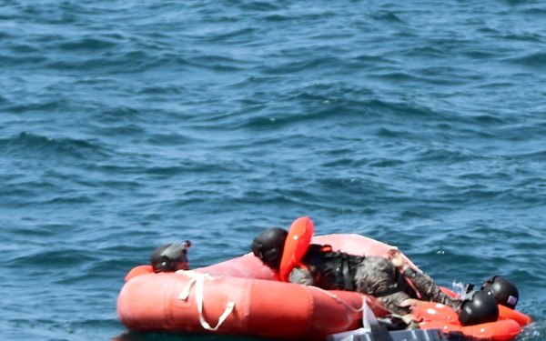 Climbing on the raft