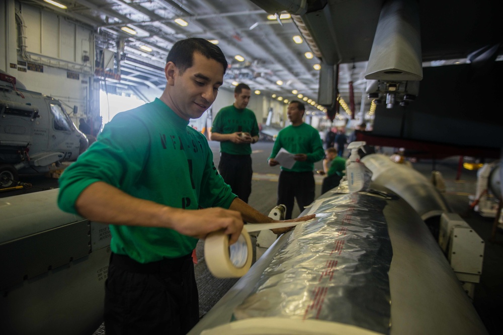 USS John C. Stennis sailors conduct maintenance