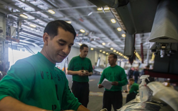 USS John C. Stennis sailors conduct maintenance