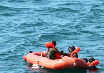 Climbing on the raft