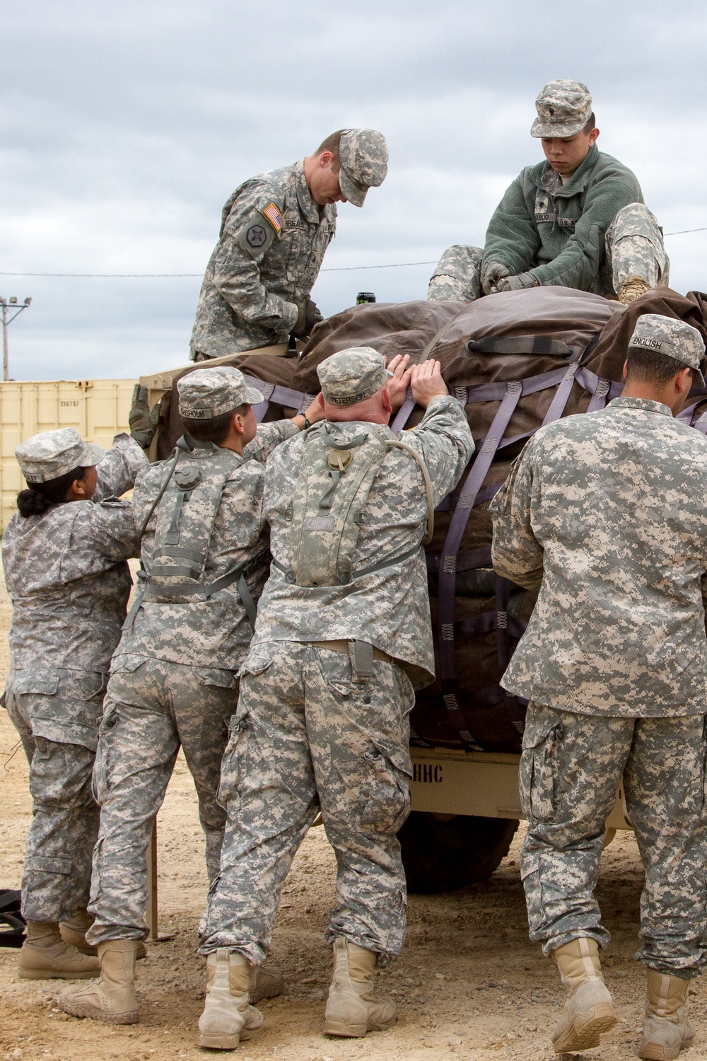 Soldiers of the 364th ESC load equipment