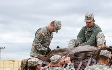 Soldiers of the 364th ESC load equipment