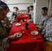 US Marines and Sailors enjoy a Birthday Meal