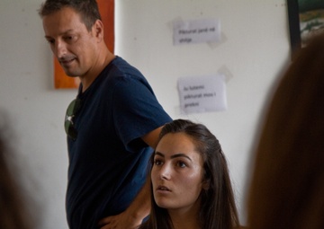 Opening doors: Bondsteel Soldiers prepare Kosovo teens for English certification test