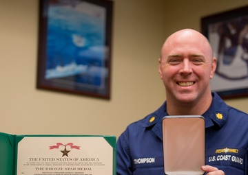 Coast Guard presents Bronze Star Medal to commander of RAID team