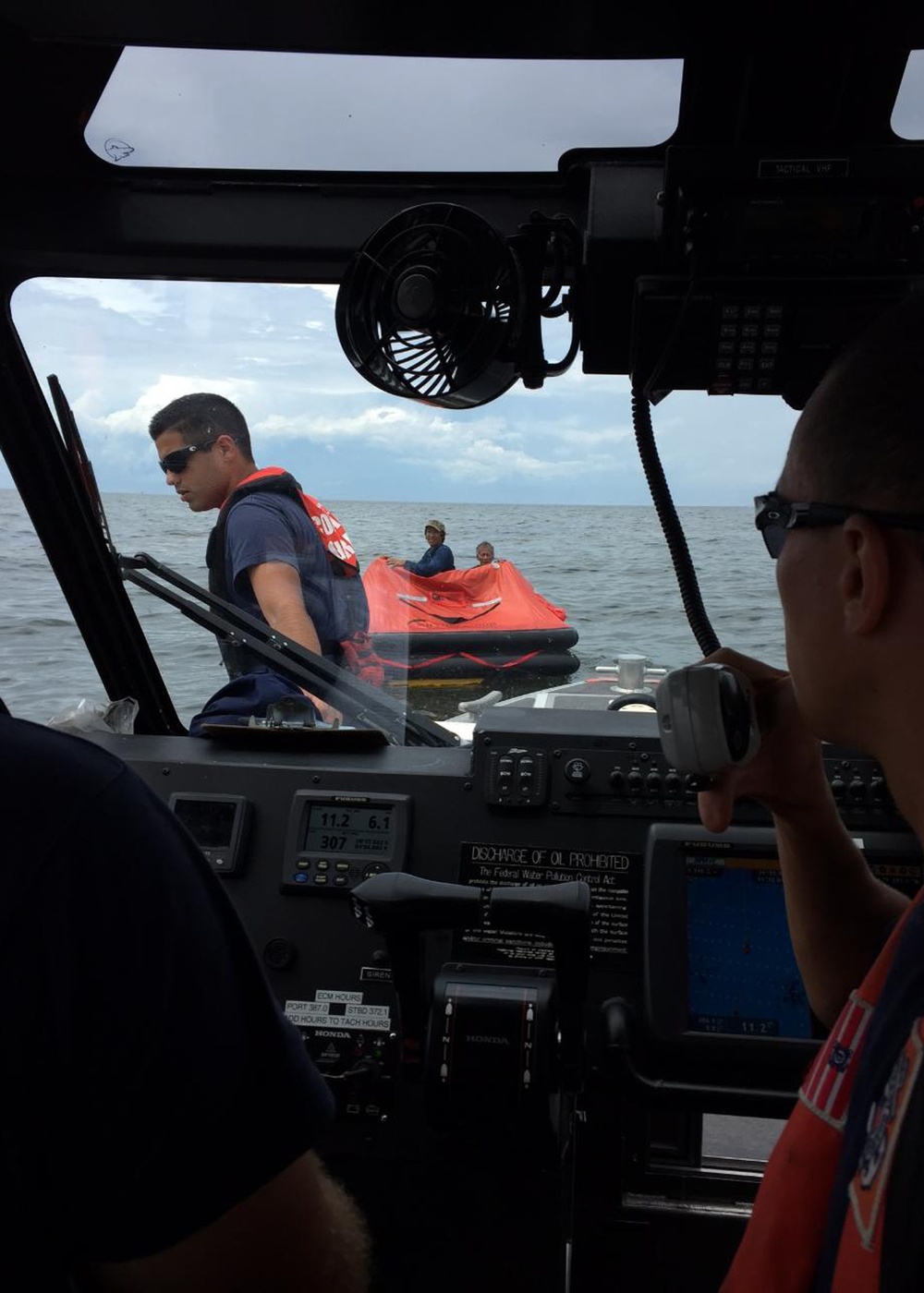 Coast Guard rescues 3 from sunken fishing vessel
