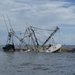 Coast Guard rescues three from sunken fishing vessel