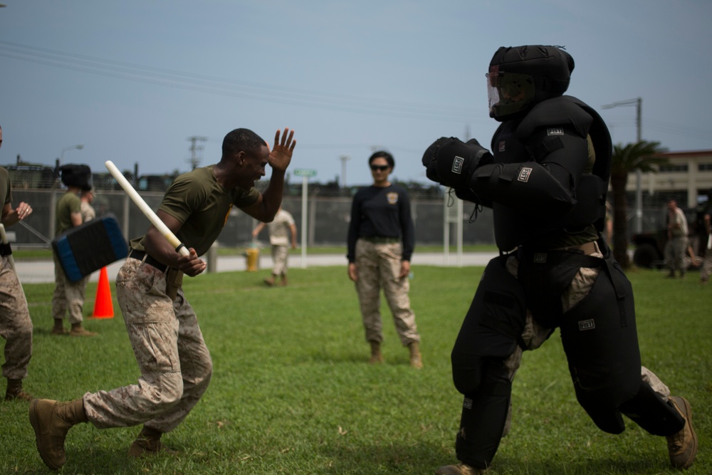 Service Members Get OC’ed to Become Non-Lethal Weapons Instructors