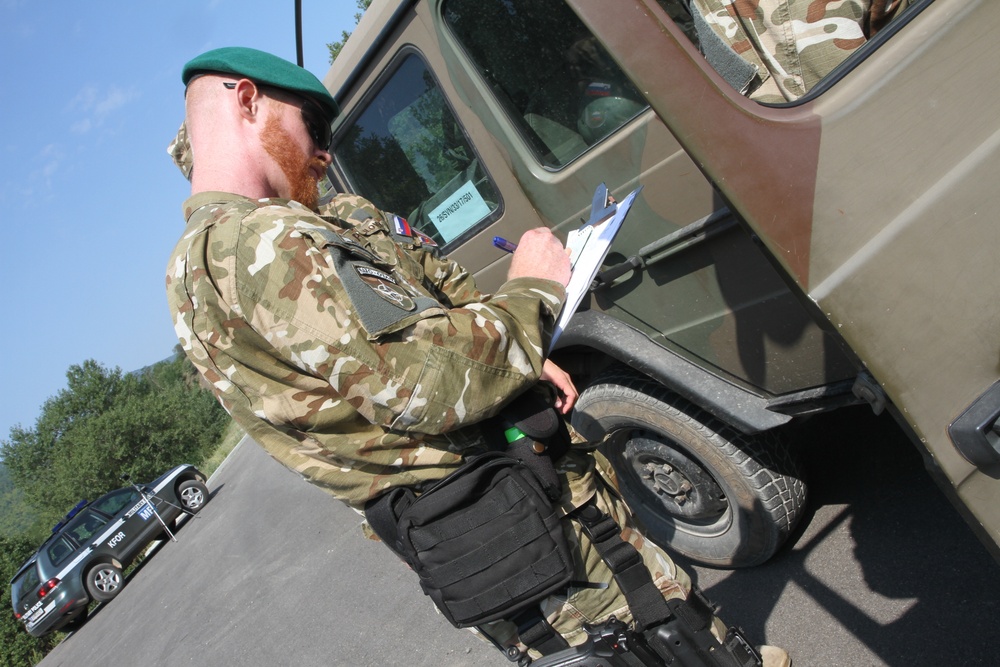 Military police from around the world hold joint traffic control point inspections