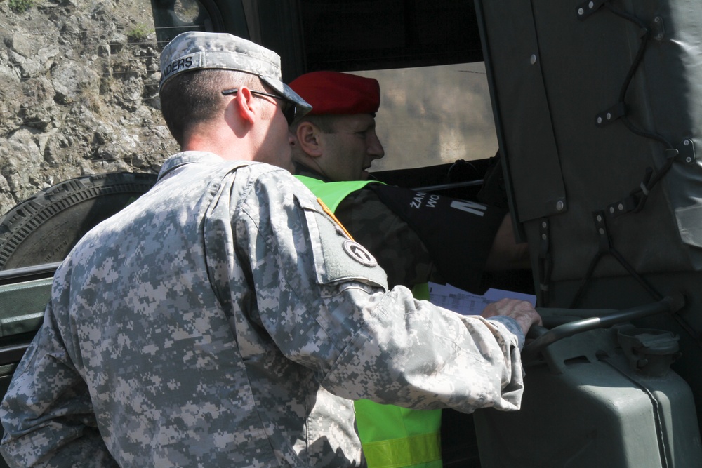 Military Police from around the world hold joint traffic control point inspections