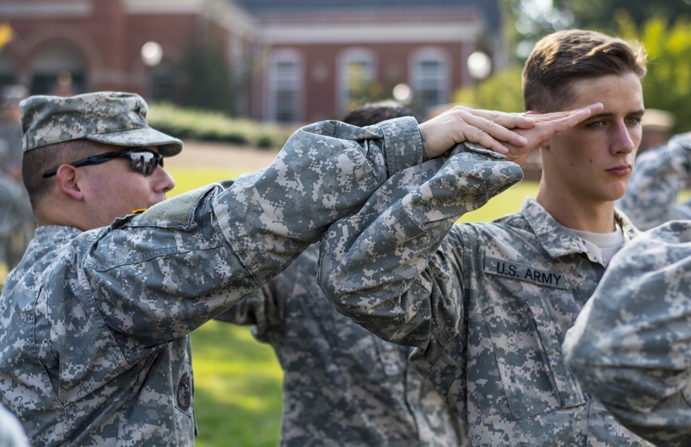 Drill sergeant teaches ROTC cadets the proper way to salute