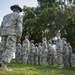 Drill sergeant teaches ROTC cadets how to march in formation