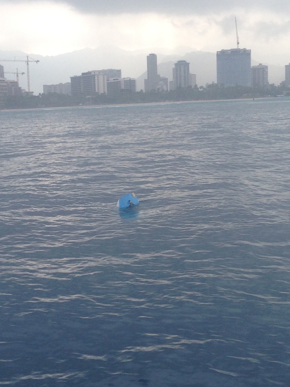 Coast Guard responds to unmanned, partially submerged vessel near Hilton Hawaiian Village