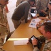 Task Force Al Asad processes Biometric Data with 7th Iraqi Division