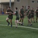 U.S. Marines play football aboard Camp Lemonnier