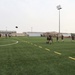 U.S. Marines play football aboard Camp Lemonnier