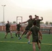 U.S. Marines play football aboard Camp Lemonnier