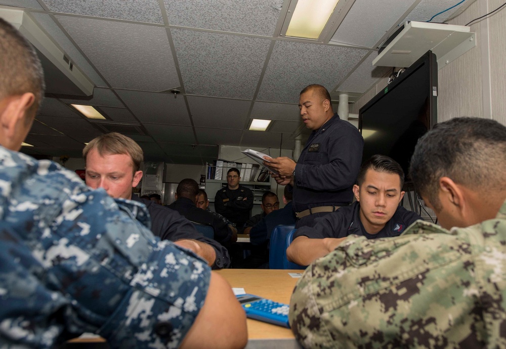 USS Germantown Sailors take advancement exam