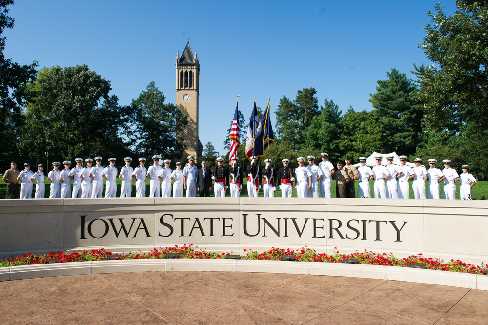 Secretary of the Navy poses with Iowa State University NROTC