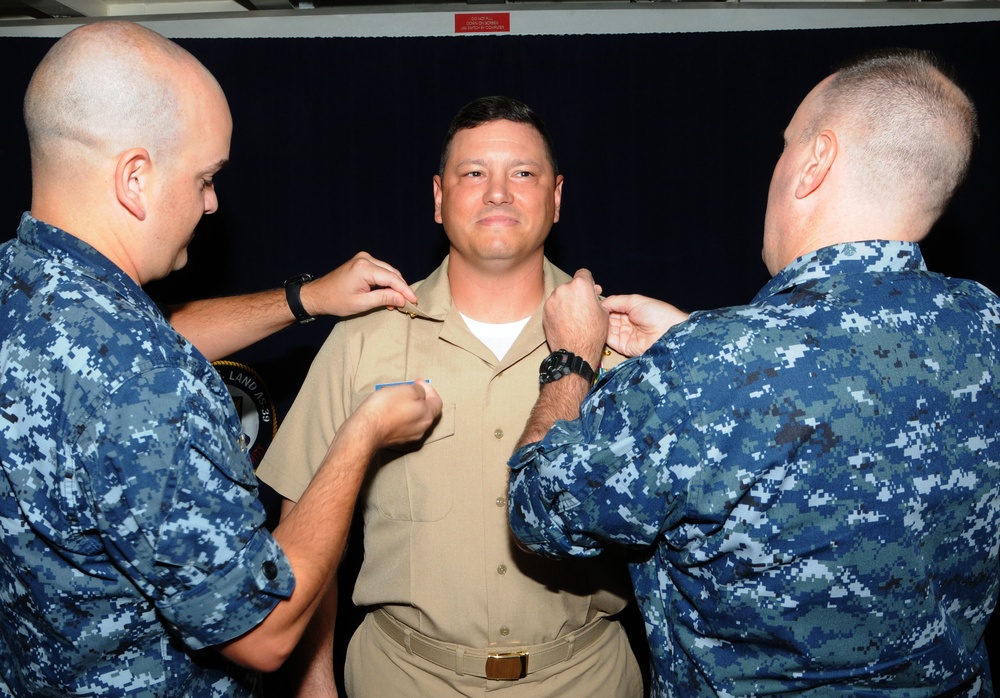 USS Emory S. Land operations officer frocked