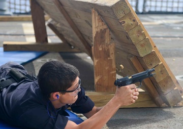 USS Forrest Sherman Sailors conduct weapons qualification